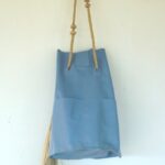 Blue bucket bag (back view)