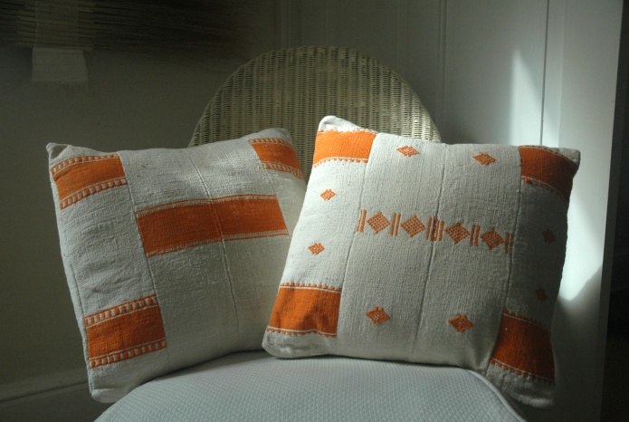 orange cushions and throws